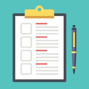Clipboard with checklist and pen